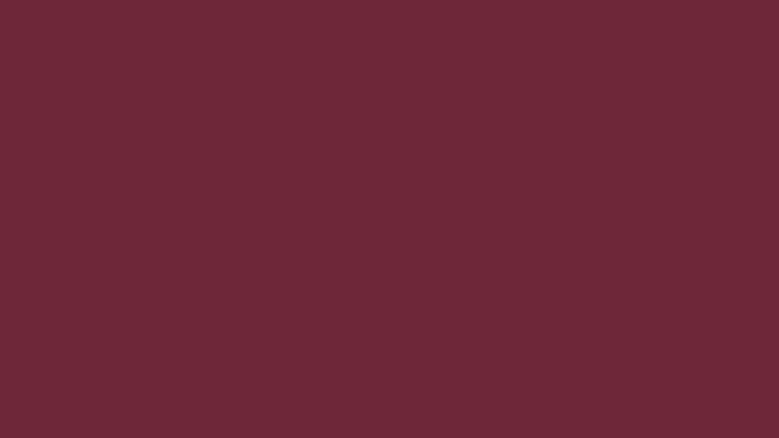 A maroon background.