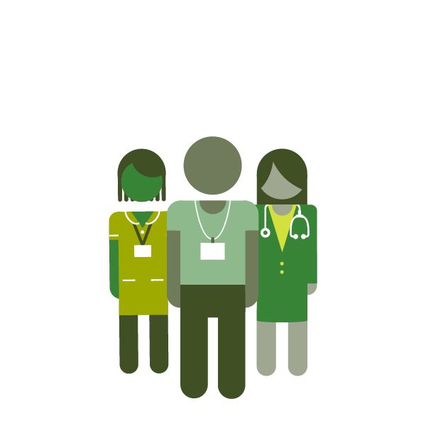 Three members of health and care staff stood together.