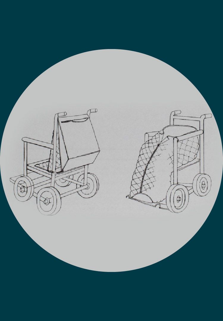 A circle with a grey background. In the centre is a fine-line illustration of two empty wheelchairs. The wheelchair on the left faces away from the viewer. The wheelchair on the right faces towards the viewer and has a zipped blanket attached to it.